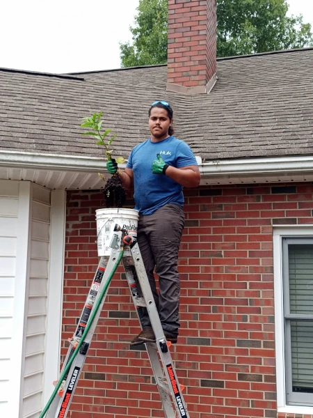 Daniel Working on Gutters