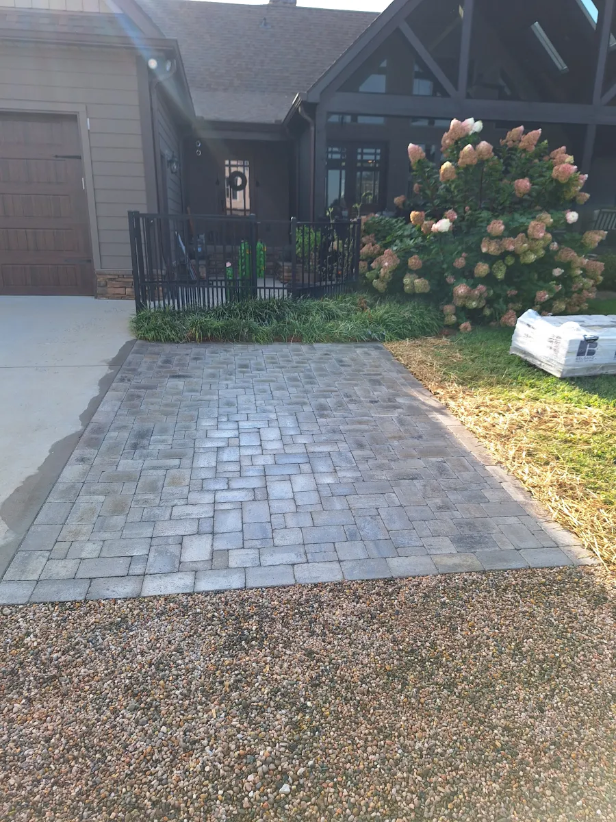 Custom stone walkway nearing completion - Olmedo Home Services craftsmanship Mocksville NC