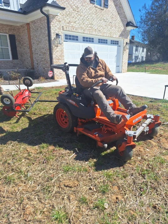 Olmedo team performing lawn seeding service